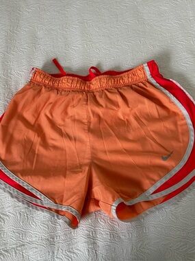 Nike Women’s Orange Athletic Shorts with Red & White Trim